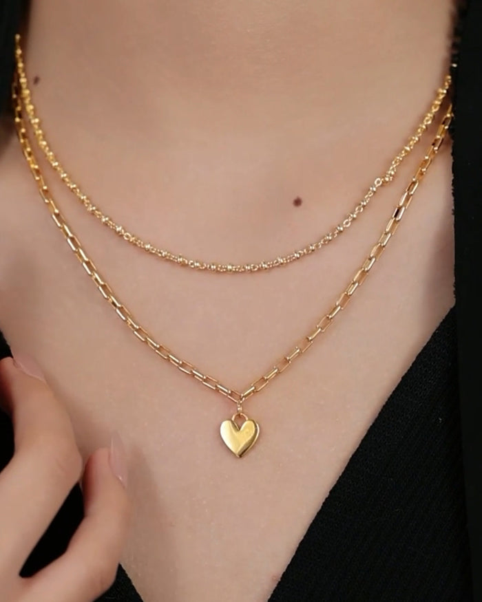 Double-layered heart-shaped gold necklace