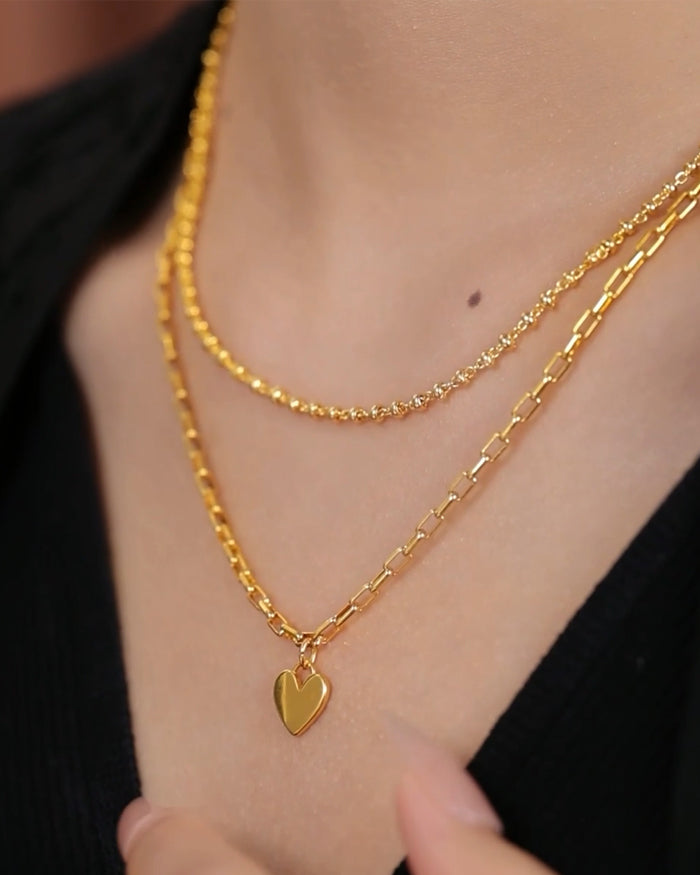 Double-layered heart-shaped gold necklace